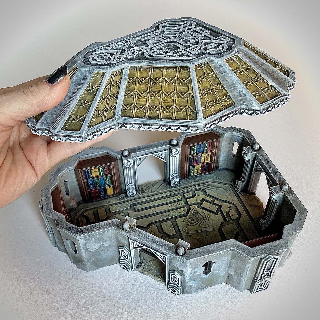 I handpainted these awesome dwarven buildings from The Kingdom of Durak Deep collection designed by Conquest Creations. 👉 Do you want me to paint your models as well? Keep on reading. These buildings (The Mineshaft, The Lore Masters Home, The Well House and The Dwarven Home) all have fully playable interiors and detachable roofs! Need this? I got you covered! They were printed by Eriksterrainprints. Go check out their store for the entire collection of The Kingdom of Durak Deep and many more 3D terrain and miniatures! When you buy a 3D print, it is usually not fully assembled and not painted yet. But I can take care of that for you in all desired colors! I can assemble and paint your favorite models from Warhammer, D&D or any 3D print you want build. Let me know what your wishes are and I’ll make a beautiful statue or terrain piece for you too. Feel free to send me a message. Don’t be shy. Send me a DM! I am excited to hear from you. #tabletopgames #tabletopterrain #lotr #mesbg #lotrminiatures #paintinglotr #lordoftheringsminiatures #tabletopminiatures #strategygame #miniaturewargaming #3dminiature #3dminiatures #lordoftherings #middleearth #thehobbit #wargaming #3dprinting #scenery #modelbuilding #tabletop #tabletopscenery #dndterrain #warhammerterrain #terrainbuilding #miniatureterrain #middleearthstrategybattlegame #miniaturehouse #kingdomofdurakdeep #wargamingterrain #dwarfhouse