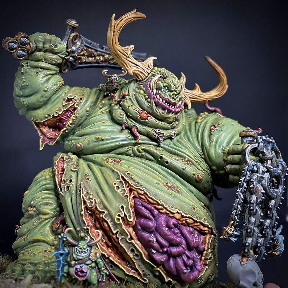 The Great Unclean One / Rotigus is built and painted. There are 3 different distinct builds for AOS and 40K. I have magnetized all the parts of the Great Unclean One and Rotigus. We now have 3 different heads, 3 left arms, 3 right arms and 2 stomach inserts. This way, you can play any variant you want. This is a truly vile model (in the most positive sense of the word!) – it celebrates its corpulence, with rotten, torn flesh slipping aside on its enormous gut to reveal winding intestines within. What an awesome model. Those details are perfectly gruesome. Warhammer - Age of Sigmar and 40K Maggotkin of Nurgle. 👉 Do you want me to build or paint for you? Feel free to contact me. I am excited to hear from you! Height: 13 cm (without weapons) Patching: Green Stuff by citadel_paints Base: custom made with clay Paints: vallejocolors Painted to level: Display Publisher: warhammerofficial Painted by: Debbie Maasdam