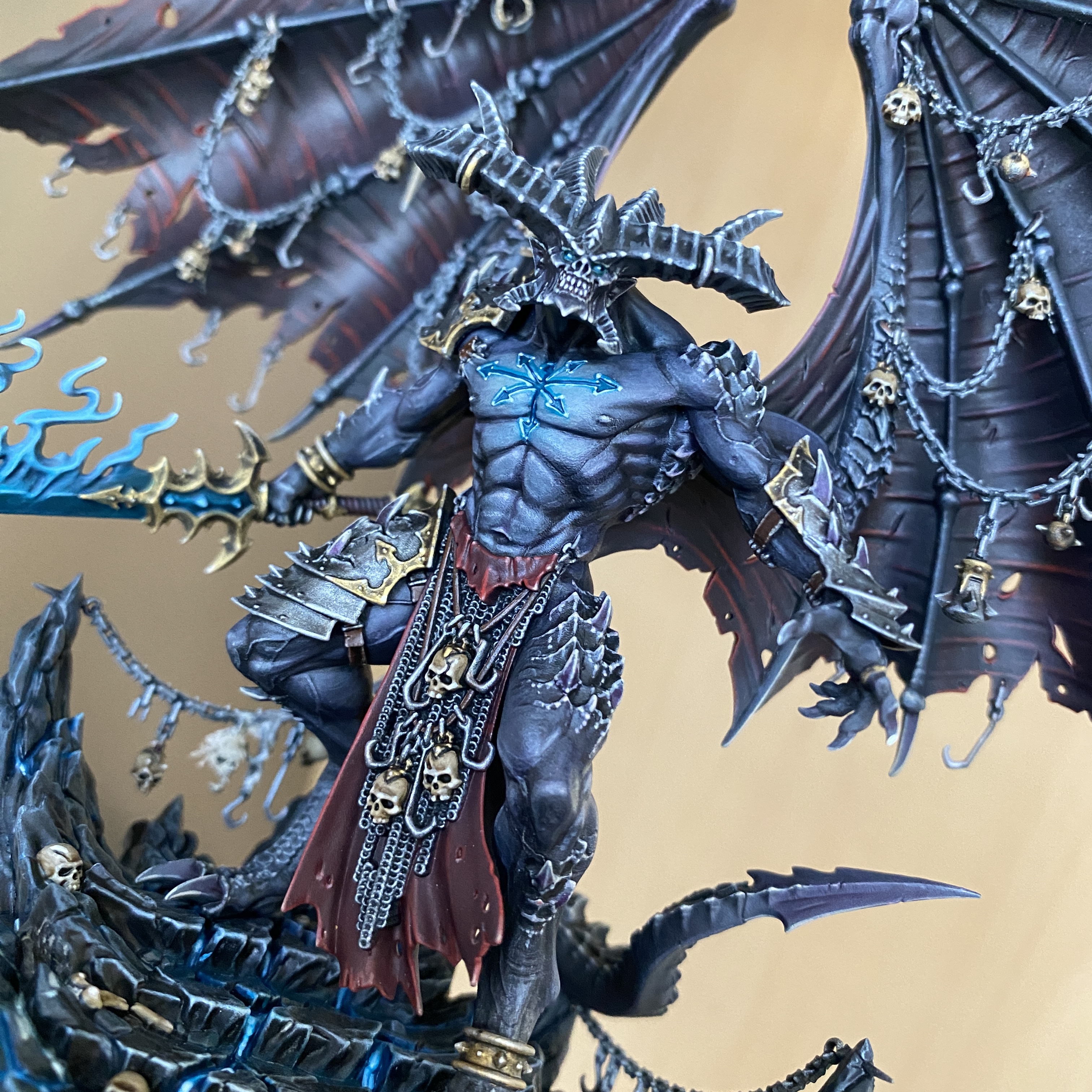 Meet Be’lakor, the first Daemon Prince of Chaos! I assembled, patched and painted this beautiful model for a client. Be’lakor is every bit the creature of nightmare he appears to be. Supernaturally skilled in both the martial and magical arts, his imposing figure is the perfect centrepiece for an army of Chaos and a potent wrecking ball with which to cast your enemies aside. I build the kit option themed for a Warhammer Age of Sigmar Slaves to Darkness army with a hand made icy base. Height: 18 cm (with base) Patching: Green Stuff by citadel_paints Base: custom made with ice and snow Paints: vallejocolors Painted to level: Display Publisher: warhammerofficial Painted by: Debbie Maasdam