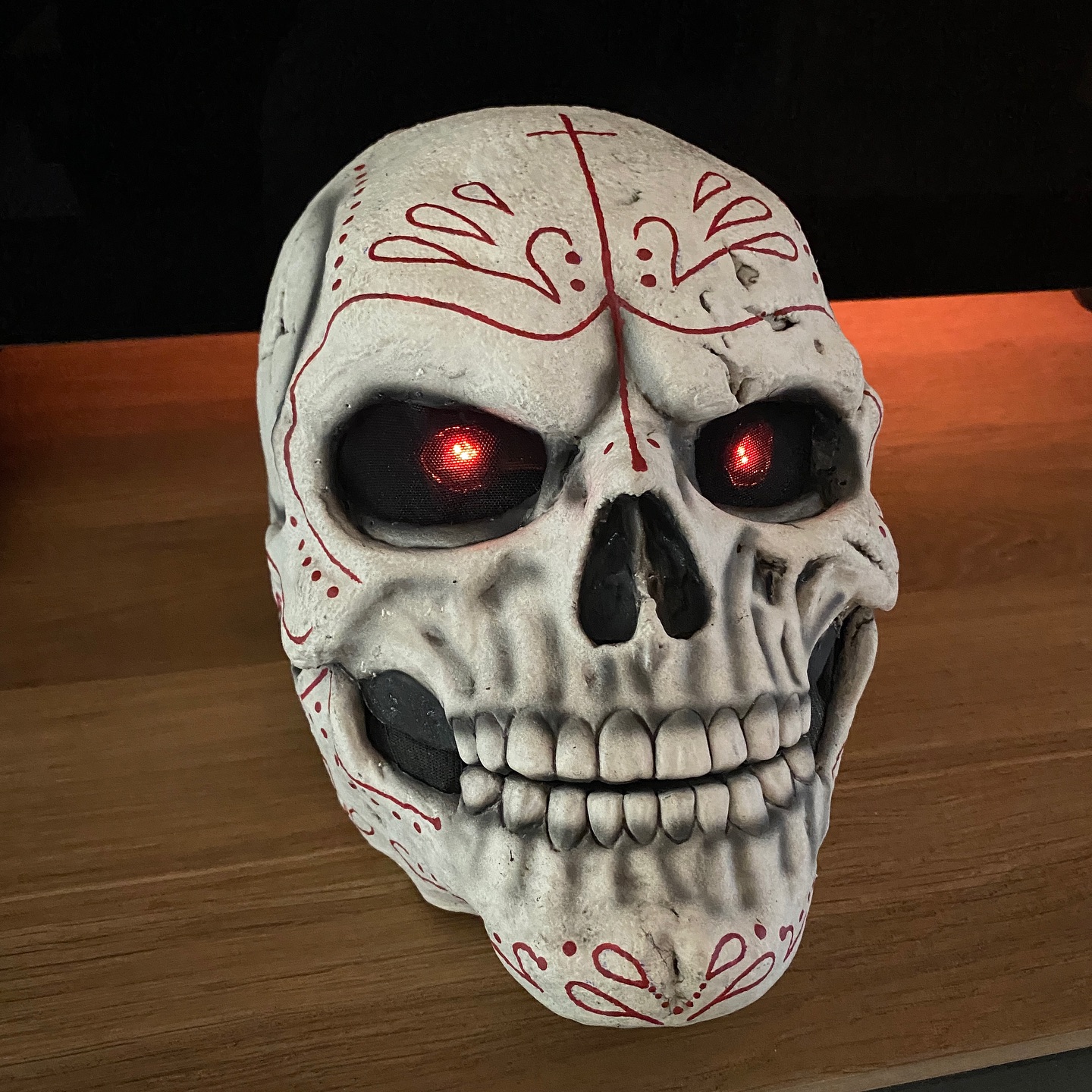 Project: Custom Skull Mask with Moveable Jaw and LED eyes. I created this for the band Pene Corrida. I recently had the pleasure of creating a custom-designed skull mask for a client. This special piece features a moveable lower jaw, which allows for realistic movement and expression. To enhance its look, I included LED lighting in the eyes, giving it a distinctive glow. I hand-painted the mask to capture the style of traditional Cinco de Mayo designs. The mask has a playful, mischievous grin, adding unique character and charm. The combination of the moving jaw and LED-lit eyes brings a sense of dynamism to the overall experience. I’m very happy with how it turned out and look forward to seeing it in action at future events. 👉 Do you want me to build or paint something for you? Feel free to contact me. I am excited to hear from you!